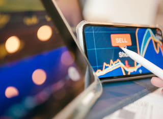 Bitcoin, Ethereum, and forex options being analyzed by a multi-market trader